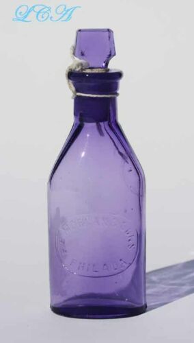 Antique F E Morgan apothecary bottle w Glass Stopper Translucent