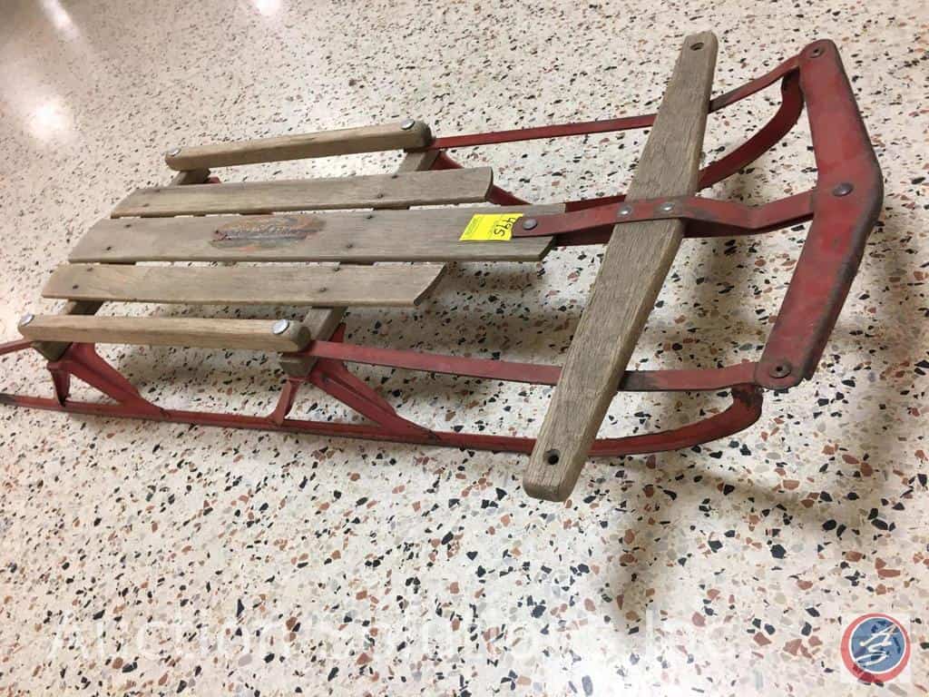 Sled with metal runners
