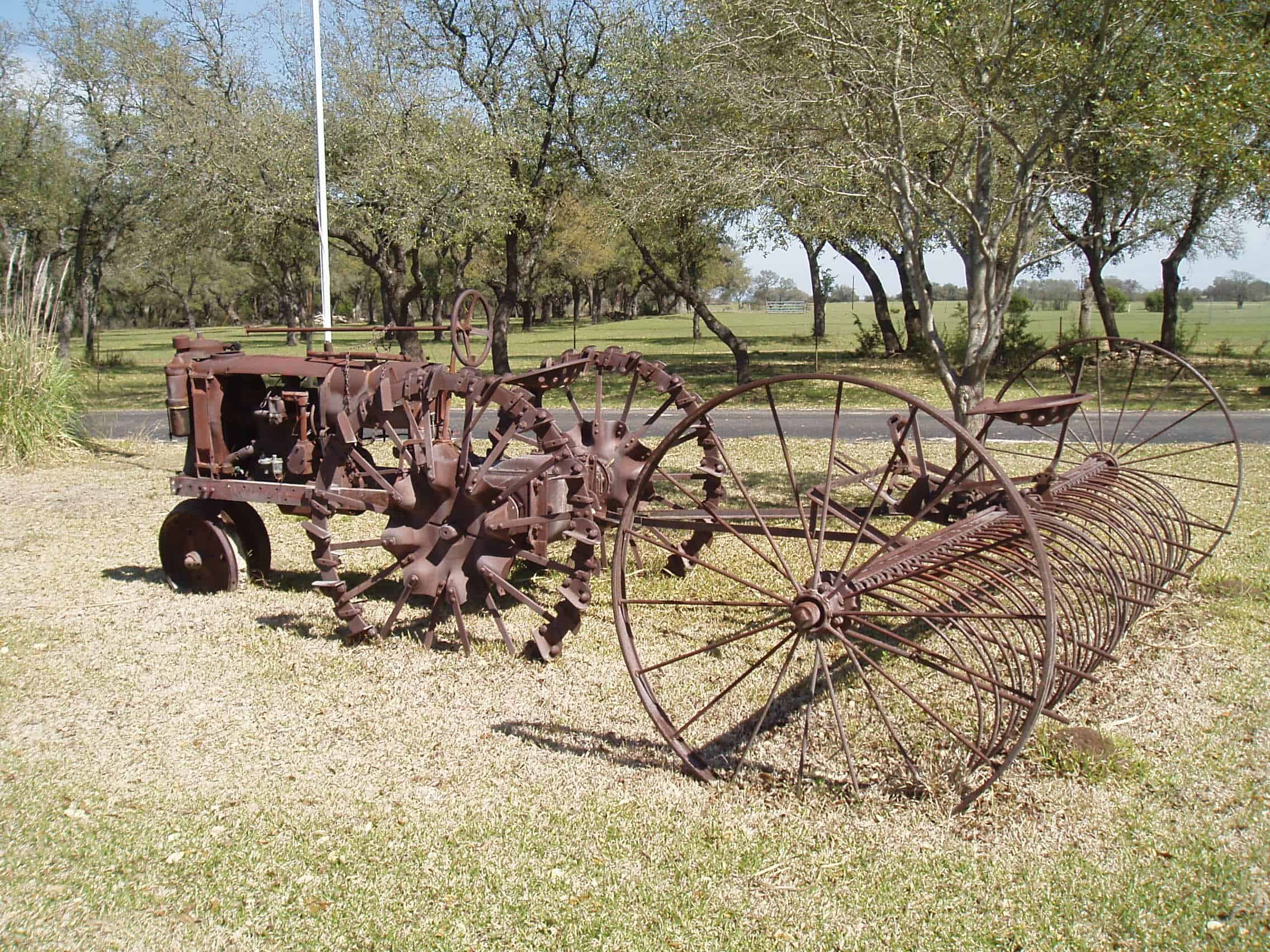 Tractor-drawn rakes