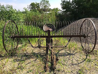 antique horse-drawn hay rake
