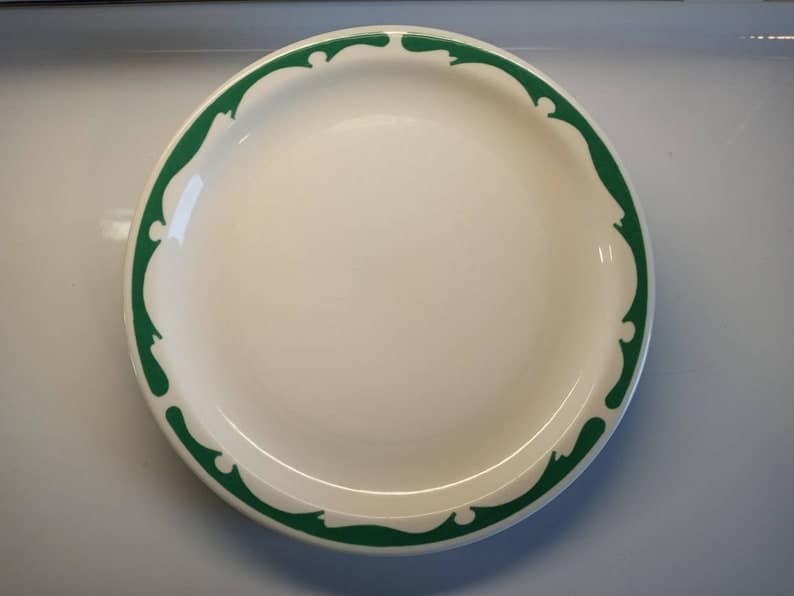 Buffalo china Oneida dinner plate with green edge