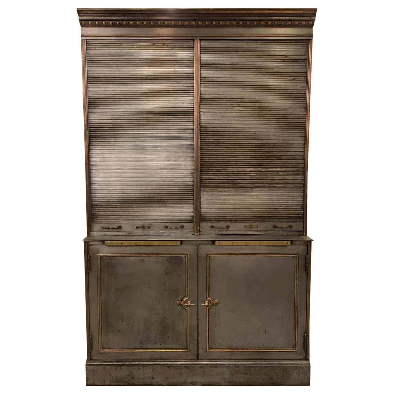 Display cabinet with steel and brass roll-top safe