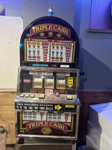 IGT triple cash slot machine