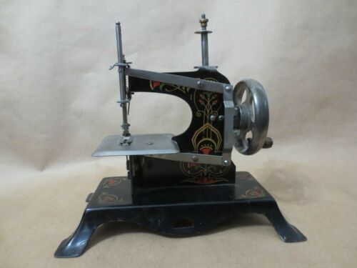 Miniature German hand-painted toy sewing machine
