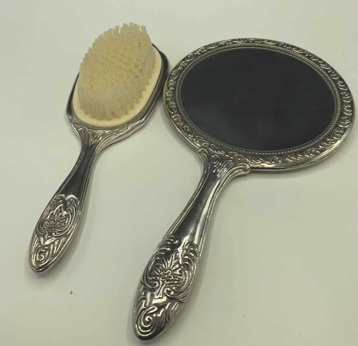silver-plated vanity set and brush
