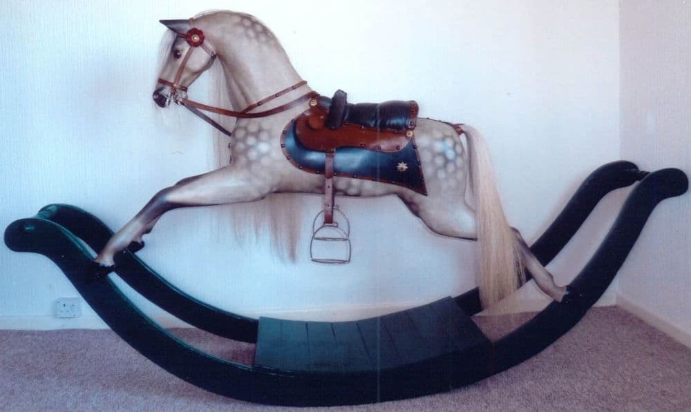Antique bow rocking horses