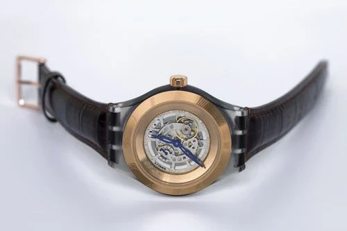 Swatch Diaphane One Turning Gold Watch SVAZ100